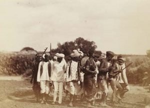 Men treading ganja in Ahmednagar, India 1893