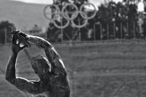 statue with olympic rings