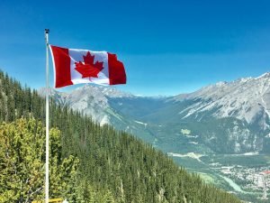 canadian flag in mountains